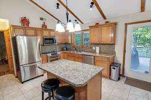 Fridge, microwave, oven, stovetop - Golf Course Getaway: XL Cabin w/ Hot Tub, Pools, Beaches, Game Room, King Bed (Lake Ariel)