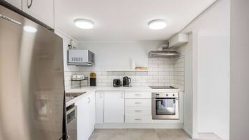 Casa, 3 quartos, para não fumantes | Cozinha privada | Geladeira, micro-ondas, fogão, cooktop