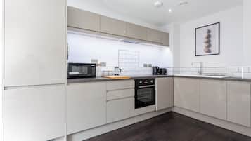 Apartment, 1 Bedroom | Private kitchen | Fridge, microwave, oven, dishwasher