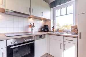 Réfrigérateur, four, plaque de cuisson, lave-vaisselle