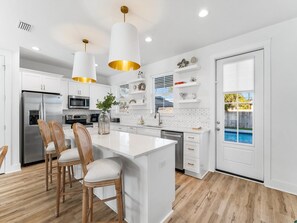 House, Multiple Beds, Pool Access (Coastal Haven C - No Pets Allowed) | Private kitchen | Fridge, microwave, oven, stovetop - Coastal Haven C by Resort Collection (Panama City Beach)