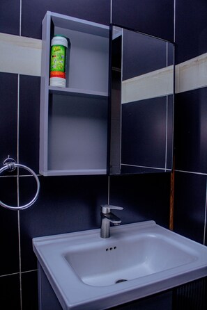 Apartment, Garden View | Bathroom | Slippers - Luxury One Bedroom Apartment Kampala (Kampala)