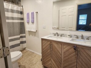 Hair dryer, towels, soap, shampoo