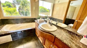 Shower, jetted bath, hair dryer, bidet