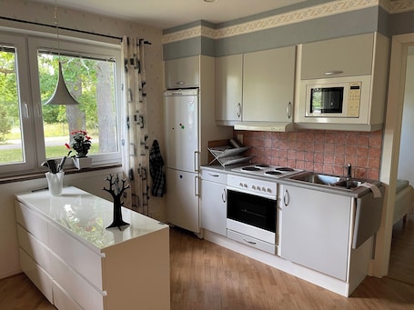 Private kitchen. Welcoming apartment with WiFi and all you need in charming Virserum