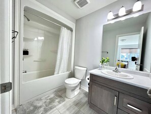 Hair dryer, towels, soap, shampoo