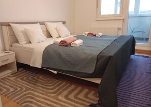 2 dormitorios, tabla de planchar con plancha, wifi gratis y ropa de cama