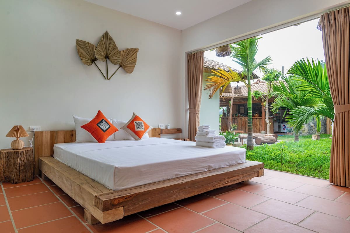 Habitación doble Deluxe, vista al jardín | 1 habitación, cortinas blackout, wifi gratis y ropa de cama