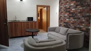 Quarto com design assinado | Área de estar