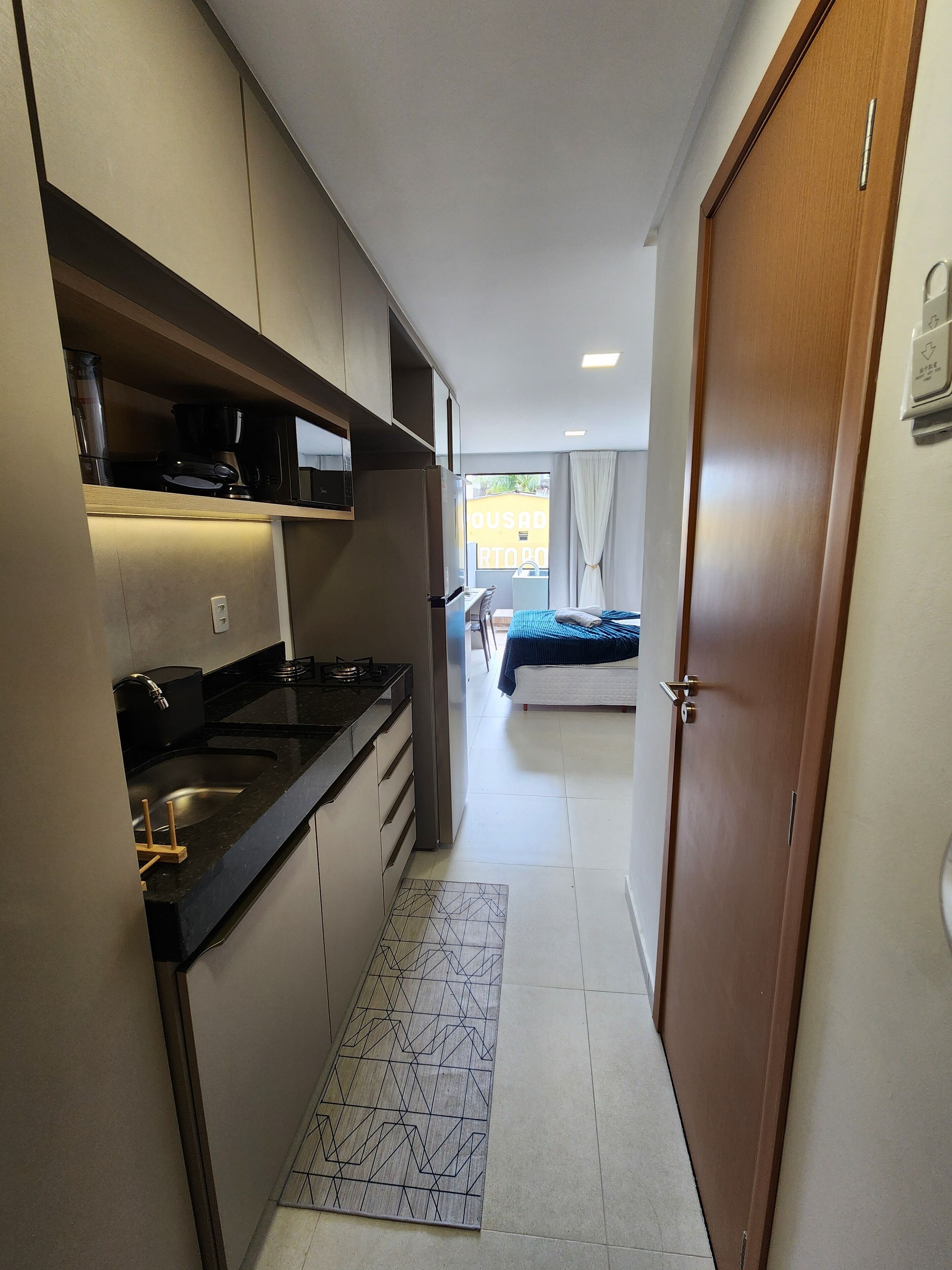 Premium Studio, City View | Private kitchen | Fridge, microwave, stovetop, cookware/dishes/utensils