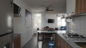 Microwave, stovetop, blender, cookware/dishes/utensils