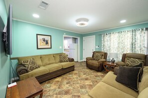 Family Cabin | Living area | 55-inch Smart TV with digital channels - Turn On Inn (Lake Village)