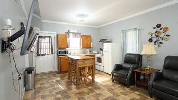 Comfort House | Living area | 55-inch Smart TV with digital channels