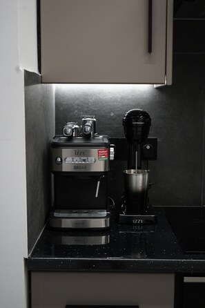 Fridge, microwave, oven, stovetop - Mackenzie boutique apartment with pool (Larnaca)