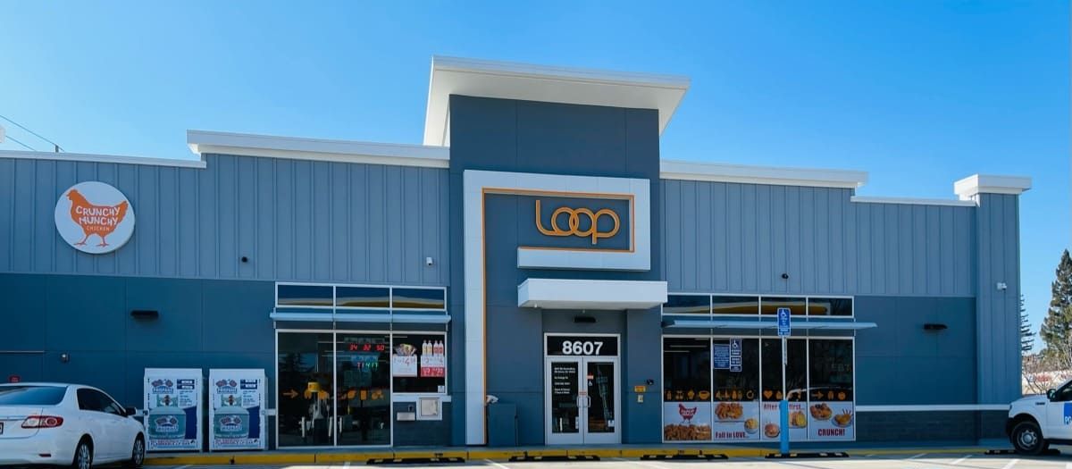 A commercial building with a sign for 'Loop' and 'Crunchy Munchies'.