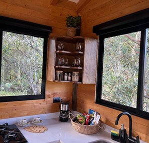 Comfort Cabin | Private kitchen | Full-size fridge, stovetop, dishwasher
