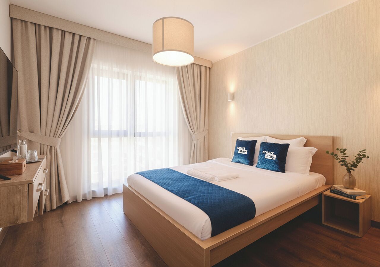 Chambre quadruple Affaires | Décor unique, ameublement unique, rideaux d’obscurcissement