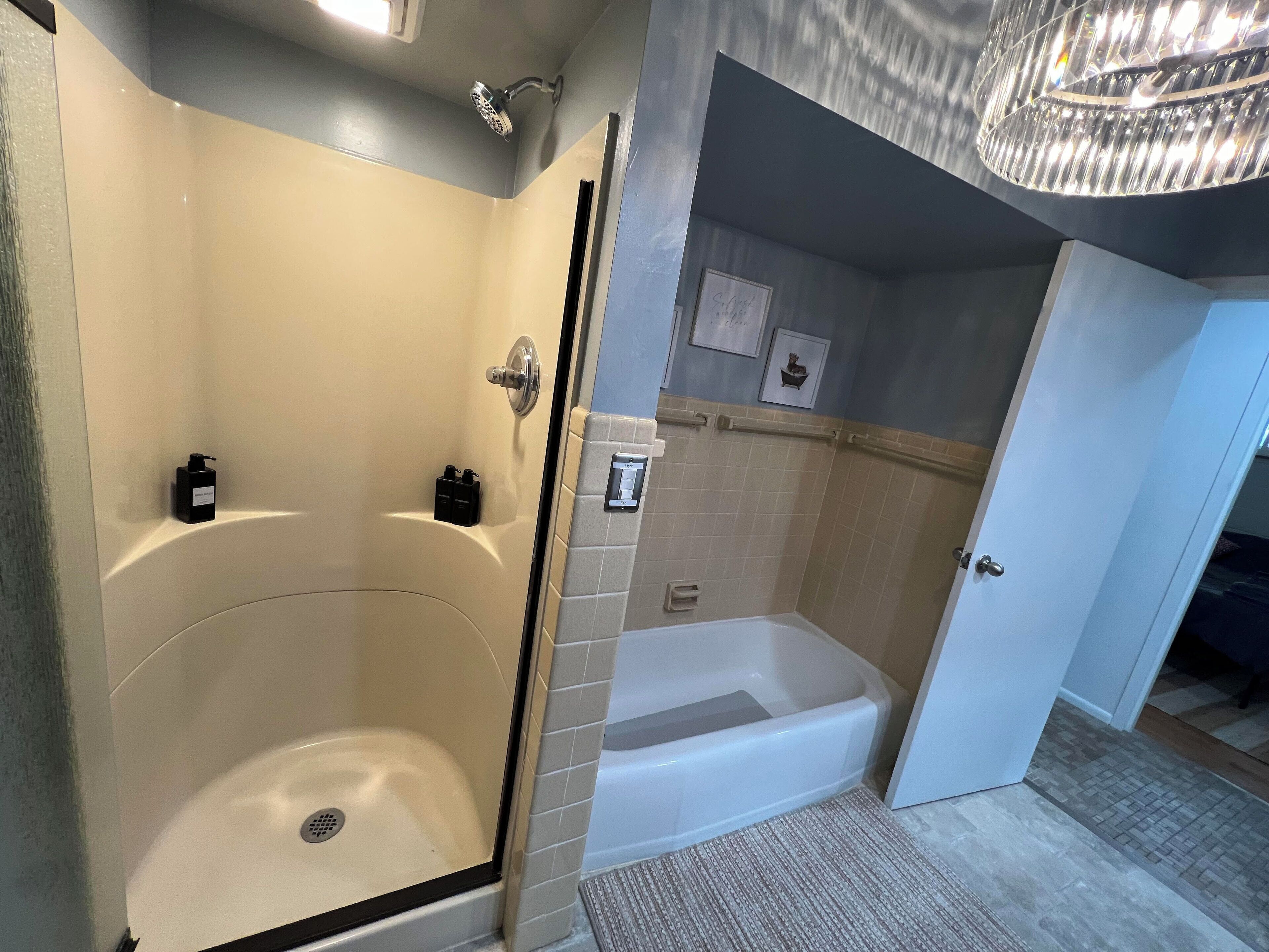 Shower, hair dryer, towels, soap