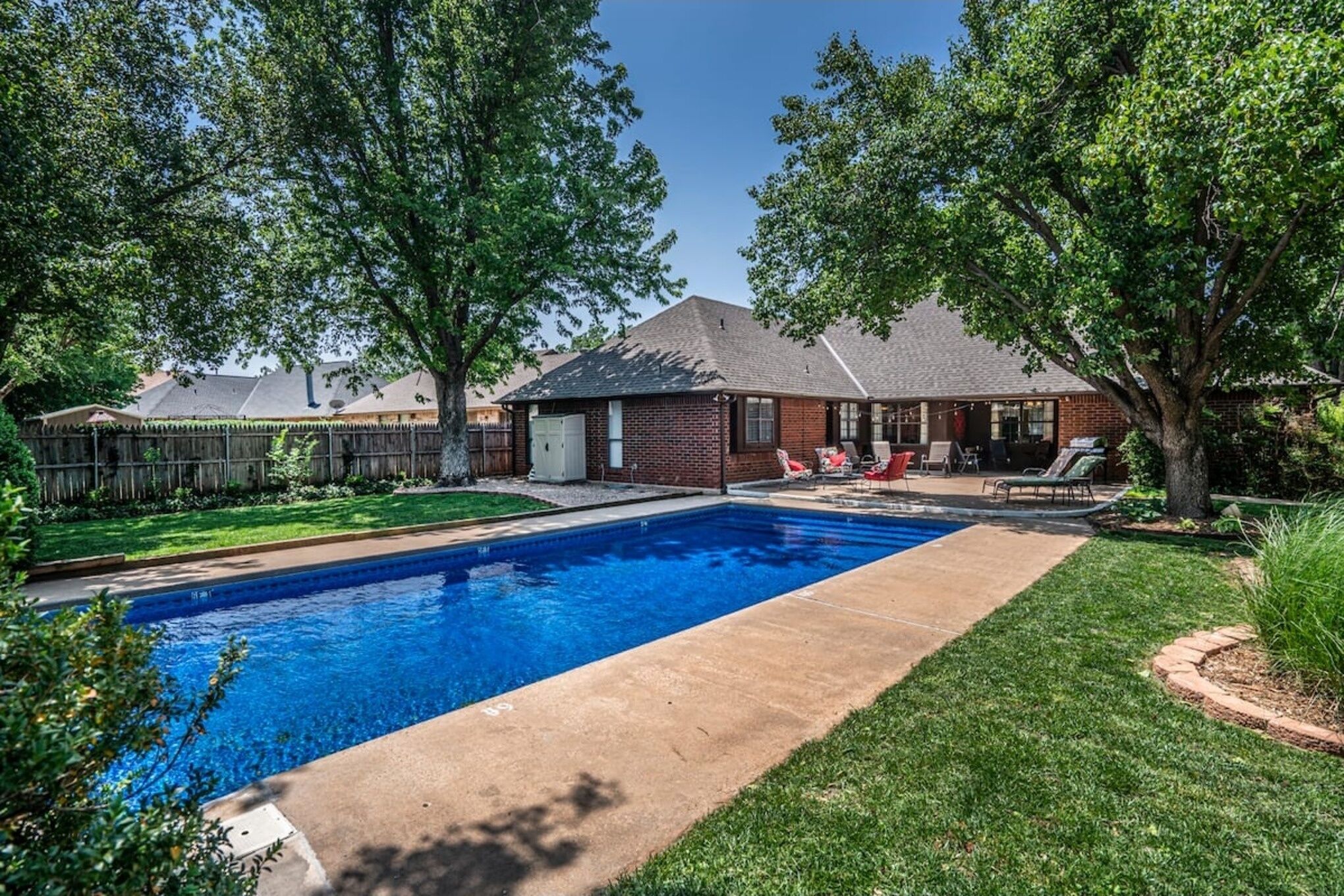 NEW LISTING! Spacious Retreat with Shaded Yard & Games by RedAwning
