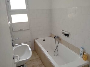 Shower, towels, soap, shampoo