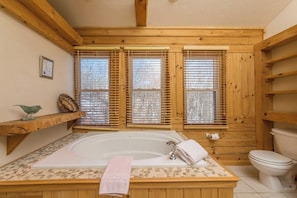 Jetted tub, hair dryer, towels, soap