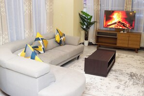 Superior Apartment, 3 Bedrooms, Kitchen, Garden View | Living area | Flat-screen TV - Royal Links Apartments Nyali (Mombasa)