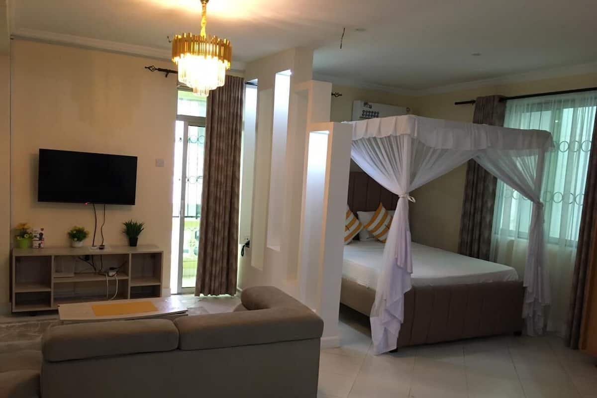 Deluxe Studio Suite, 1 Queen Bed, Balcony, City View | Iron/ironing board (on request), WiFi (free)