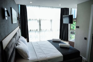 Family Triple Room, City View | Laptop workspace, soundproofing, iron/ironing board, free WiFi - Swiss İnn Express (Ankara)