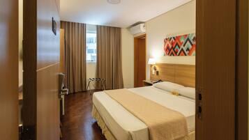 Deluxe Double Room, City View | In-room safe, desk, laptop workspace, iron/ironing board