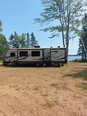 Exterior - Cozy 2-bedroom RV with Private Sandy Beach on the Sturgeon Bay! (Saint Andrew’s parish)