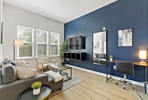 Living area - Stylish Studio DT | Pool, Gym, W/D & Free Parking (Charlotte)