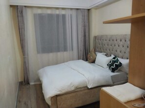 1 habitación, tabla de planchar con plancha, wifi y ropa de cama 