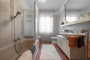 Hair dryer, bidet, towels, soap