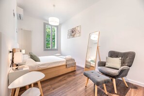 1 chambre, fer et planche à repasser, Wi-Fi, draps fournis