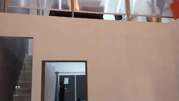 Family Duplex | Living area | 32-inch Smart TV with cable channels