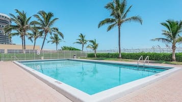 Outdoor pool, pool umbrellas, sun loungers
