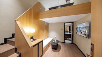 Loft Family Triple Room with One King Bed and One Single Bed | Premium bedding, memory foam beds, desk, blackout drapes