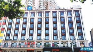 A multi-story hotel with a modern facade, featuring balconies and large windows. - HanTing Hotel (Rui'an Wansong Road) (Rui'an)
