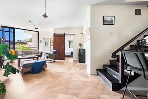 Apartamento, balcón | Zona de estar