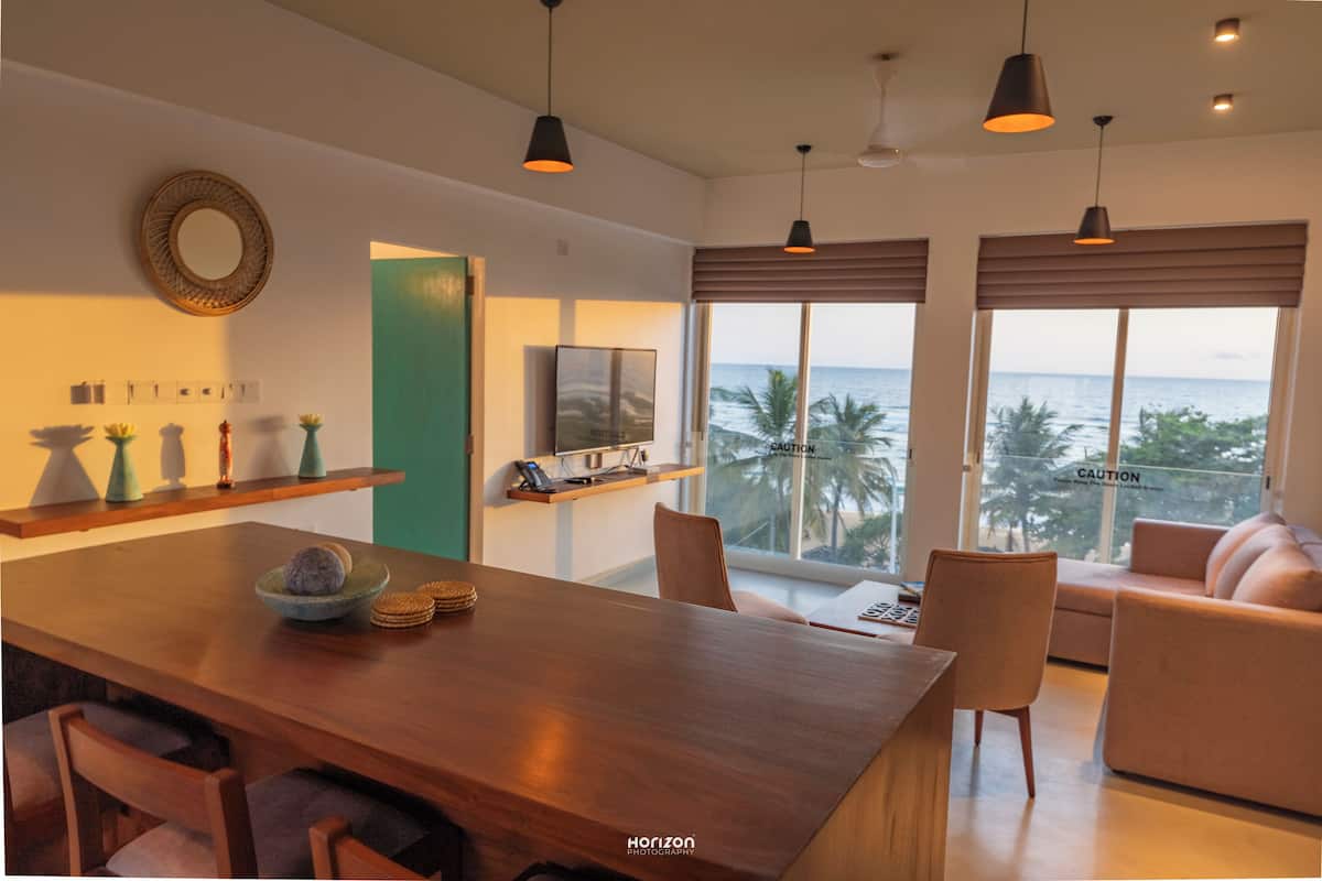 Deluxe Apartment, Sea View | Living area