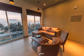 Deluxe Apartment, Sea View | Living area