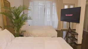 2 chambres, fer et planche à repasser, Wi-Fi, draps fournis