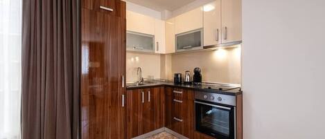 Fridge, stovetop, coffee/tea maker, toaster