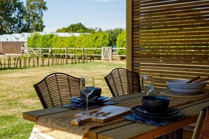 Outdoor dining - Restored Showman's Carriage with King Bed (Batchmere)
