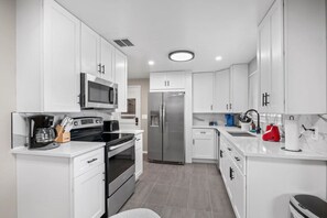 Fridge, microwave, oven, stovetop - Family-Friendly 4BR Retreat in Westminster (Westminster)