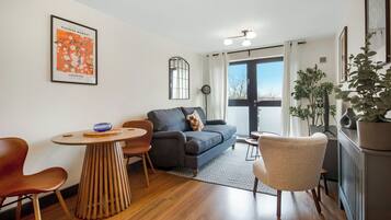 House, City View | Living area | Flat-screen TV