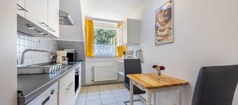 Holiday Apartment 4 with Private Garden, Balcony and Wi-Fi