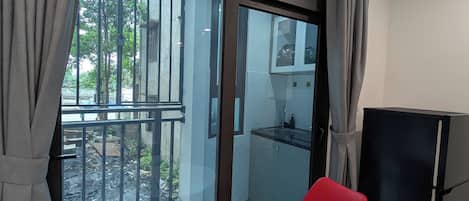 Apartamento básico | 1 quarto, frigobar, escrivaninha, Wi-Fi de cortesia