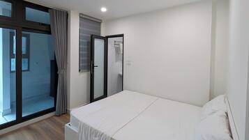 Deluxe Studio Suite, Balcony, City View | Minibar, desk, soundproofing, free WiFi