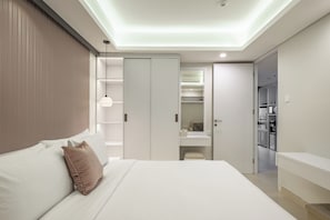 2 chambres, coffres-forts dans les chambres, fer et planche à repasser
